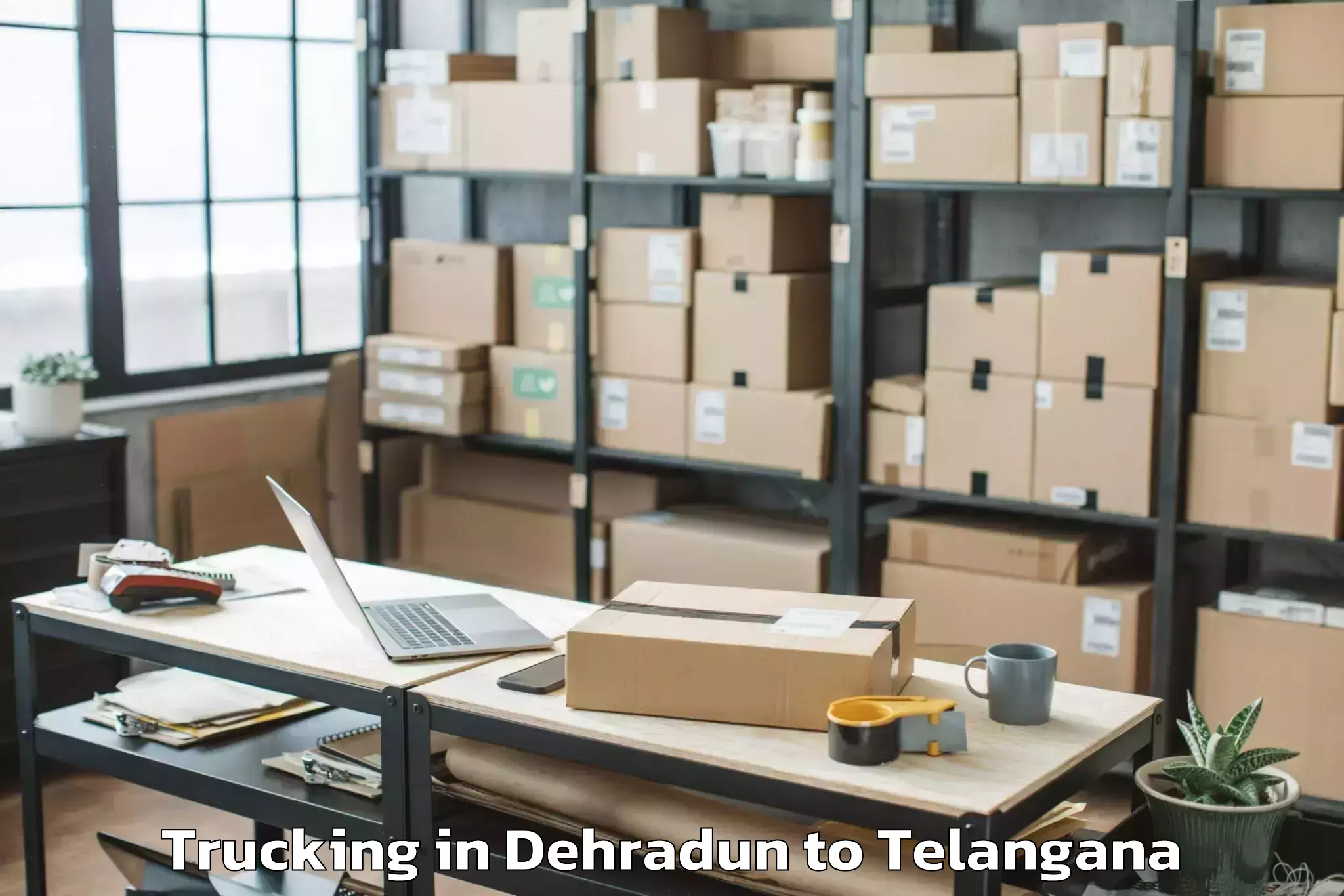 Book Dehradun to Maredpalle Trucking Online